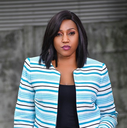 Business professional woman standing.